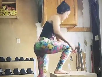 WWE - Bayley doing single leg stands for a workout 
