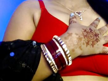Desi Bhabhi slowly removes her clothes, exposes her sexy boobs and does self sex and does hot pussy fingering.