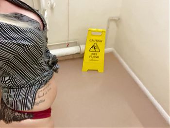 Pissing in public toilet sink 